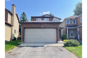 Welcome to 4 Cadence Gate, a detached 2 car garage 3 bedroom home plus den, on a fully fenced lot !
