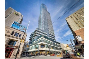One of the tallest Luxury Landmark Condo At College, Open Concept, Modern Kitchen With Central Island.