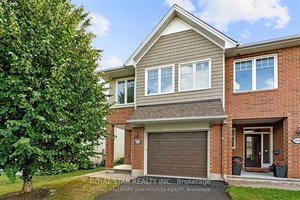 End Unit Townhome in Sought After Findlay Creek Village !