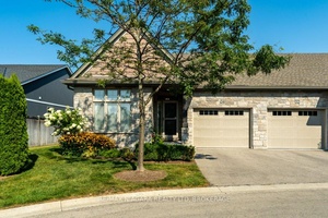 Low maintenance living in a quiet setting, walking distance to the Lake.