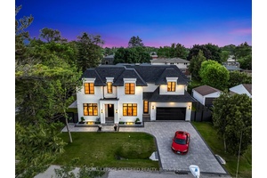 Live just steps from Lake Ontario in prime Southwest Oakville.