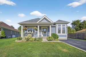 Tucked away on a quiet court just minutes from the sandy shores of Wasaga Beach, this beautifully appointed 2 1 bedroom, 2 bath bungalow offers the perfect blend of comfort, ...