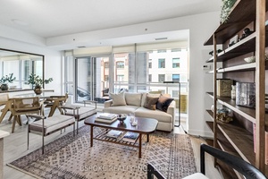 In a downtown market crowded with just another one bedroom plus den, this suite stands apart.
