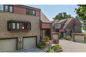 Waterfront access and located directly across from the Bay of Quinte Golf Club, this condo townhome offers an active lifestyle at an incredible value !