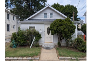 Charming 3 bedrooms amp ; 2 baths bungalow in need of some TLC.