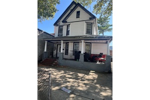 Excellent property features two spacious units each offering comfortable living space with great income potential.