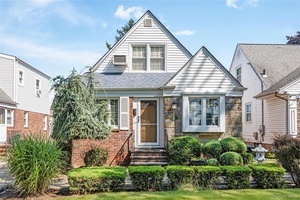 Lovingly and meticulously maintained dormered 4 bedroom, 2 bathroom brick Cape, abundant with charm and possibility, ideally located in the heart of the beautiful Village of Stewart Manor.