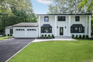 Welcome to this beautiful, totally renovated 4 Bedroom 3 12 bath colonial home with a spacious open floor plan in the heart of Kings Park.