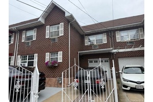 Two Family Home in Excellent condition Stunning backyard for entertaining, Conveniently Located 1 Block from the subway 'A' Train And 2 Blocks from Beach.