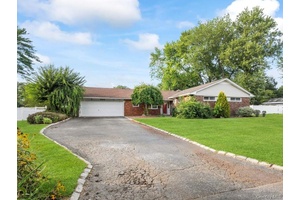 Welcome to 4 Marshmallow Drive, a spacious ranch style home nestled on a wide, tree lined street in the heart of Commack.