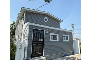 Fully renovated detached single dwelling home featuring 5 bedrooms and 2 full bathrooms.
