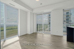 PRICED TO SELL ! Beautiful Bright CORNER Unit At Oakvillage.