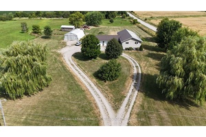 Nestled on over 100 acres of productive farmland, this grand estate offers a unique opportunity for those seeking a harmonious blend of luxury living and agricultural potential.