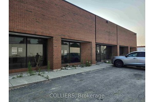 Upgraded lighting super clean building with lots of natural light and massive fenced parking area.