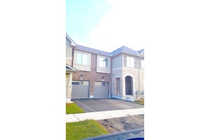 Over 1800 sq. ft spacious 3 bedroom townhouse with 9 ft ceiling on main floor located in the walking distance from Elise McGill Secondary School.
