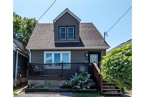 Welcome to this beautifully updated home, ideally situated on a quiet street close to all amenities.