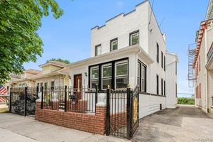Step into turn key luxury with this fully renovated, detached multi family brick home nestled in the charming City Island neighborhood of the Bronx.