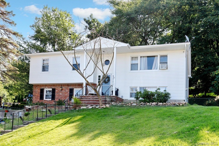 Bi-level home with brick siding