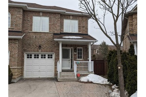 Beautiful Freehold Townhouse On A Corner Lot In The Most Prime Location.