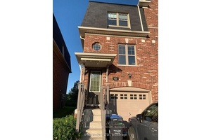 Stunning three storey town home backing onto a serene Ravine in prestigious Mount Pleasant !