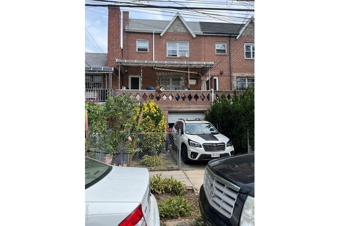 View of front of home with brick siding