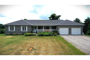 Top quality all brick Bungalow situated on a gorgeous 1.
