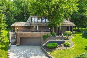 It's 2 homes in 1 nestled into the Niagara Escarpment, with no rear neighbours, ever.