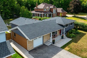 Beautifully updated and spacious Split Level home located in one of the most desirable locations in Stoney Creek Winona tucked away under the escarpment.
