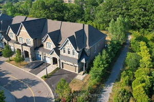 Located in a private enclave, this 4 bedroom, 5 bathroom corner townhome backs onto Fourteen Mile Creek and offers over 2, 300 sq ft above grade plus a beautifully finished ...
