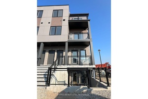 Brand new open concept 800 square foot two bedroom two bedroom main level of three story townhouse.