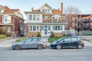 LEGAL non conforming triplex situated on a quiet boulevard in the Hamilton downtown core.