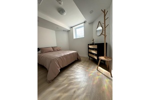 Ready to move in 2 bedroom lower level unit with private entry, parking, and legal status.