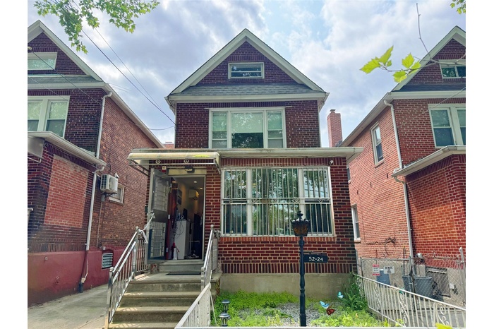 View of front of property with brick siding