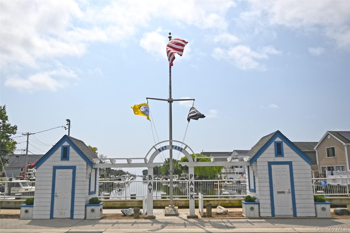 View of property's community featuring an outbuilding