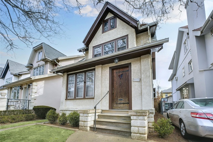 View of front of property with stucco siding