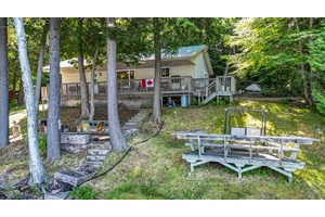 Discover tranquility at this stunning 3 season waterfront cottage on beautiful Trout Lake.