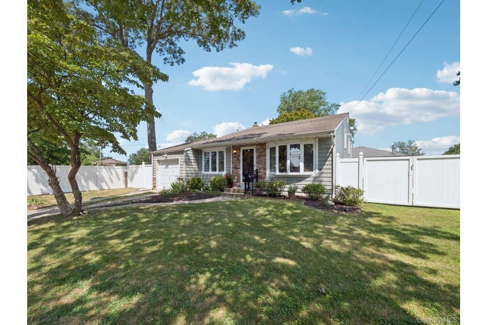 Welcome to your split-level style house on Woods Road.
