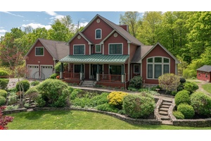 Tucked away on 20 peaceful acres in the scenic Town of Clinton, this distinctive contemporary retreat offers the rare combination of seclusion, style, and convenience.
