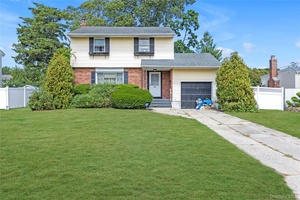 Welcome to your potential new Listing at 165 Country Village Lane, East Islip NY, 11730.