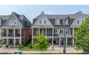 End Unit Freehold Townhouse Offered In A Very Highly Desirable Location, Located Minutes From The 401, Shopping Schools And Many Other Amenities.