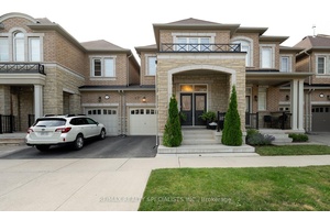 In The Heart Of Oakville's Prestigious Neighborhood Is This Exquisite 3 Bedroom, 4 Bathroom modern Master piece.