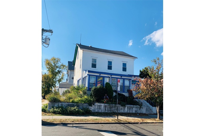 View of front of home with stucco siding