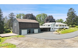 This charming fully remodeled, bright, and sunny ranch featuring 3 bedrooms, 3 full bathrooms, and 2.