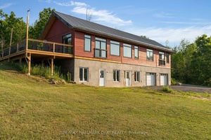 Welcome to an extraordinary opportunity just moments from the charming village of Creemore's downtown.