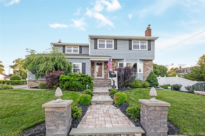 View of front of property with a chimney