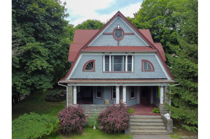 Victorian home with covered porch