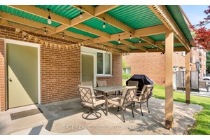 Bright and beautifully renovated LARGE lower level studio apartment in a quiet, well maintained triplex on a picturesque tree lined street.