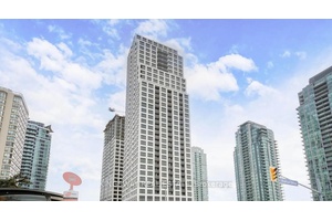 New 1 Bed Den Condo in the Heart of Mississauga Modern south facing unit with 9 ft ceilings, open concept living, and a sleek kitchen with quartz countertops.