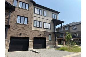 Welcome to 2610 Kettering Place, a stunning end unit townhome that combines modern style with everyday convenience.