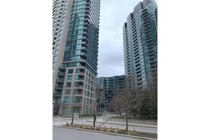 Experience elevated living in this bright and spacious condo, where floor to ceiling windows frame panoramic lake views and bathe the interiors in natural light.